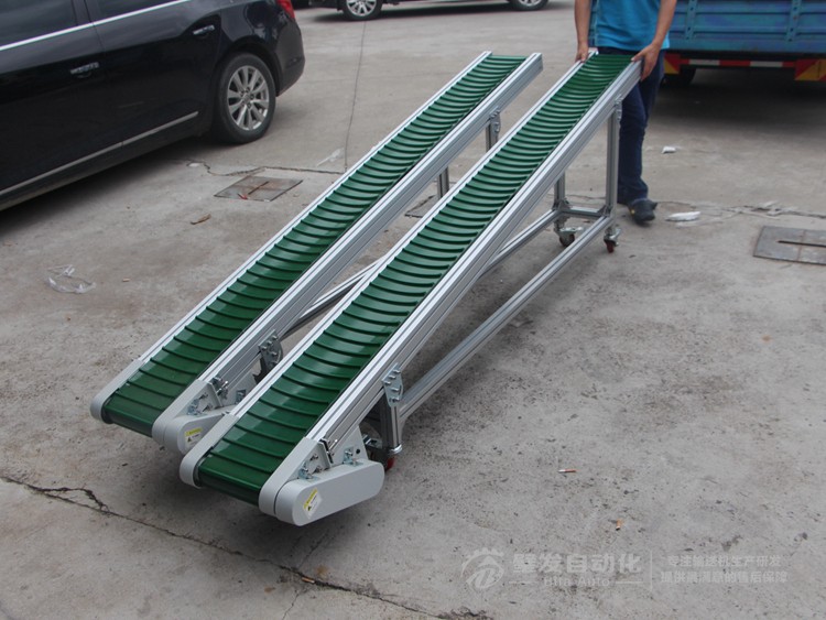 皮帶面加橫向?qū)l小型皮帶輸送機(jī) 皮帶面加橫向?qū)l小型皮帶輸送機(jī)